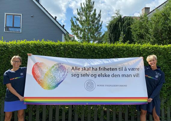Fylkesledelsen i NSF Rogaland med Pride-banner